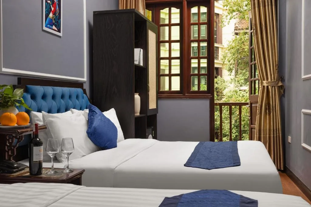 Triple Room with Balcony — Amanda Boutique Hotel & Travel